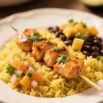 Cilantro Orange Chicken with Rice and Beans served with tropical salsa