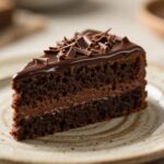 Moist chocolate cake topped with ganache