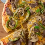 Mouthwatering Philly Cheesesteak Pizza Slice